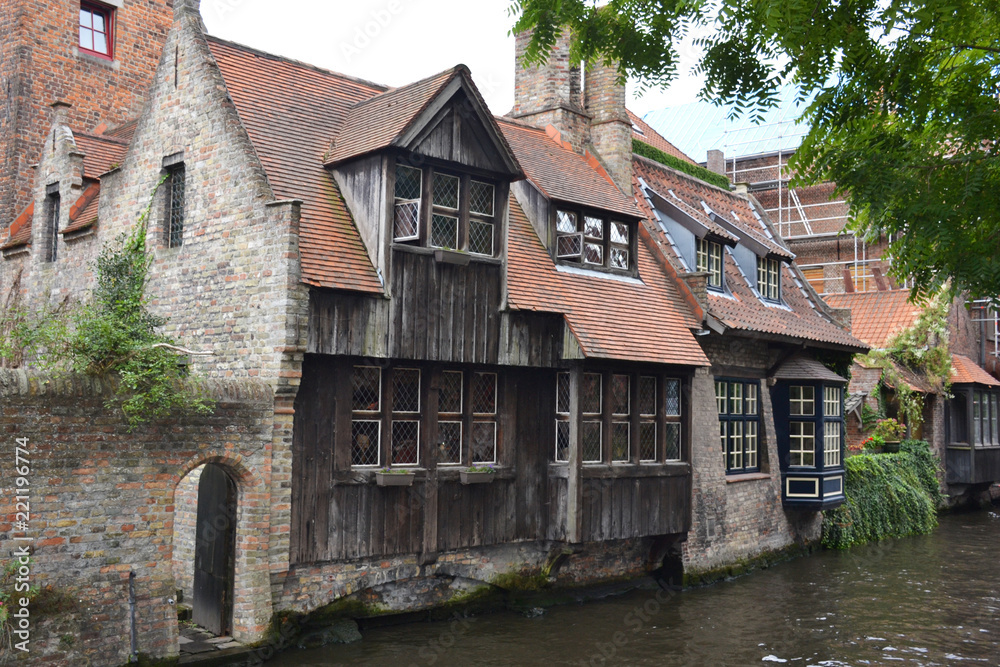 Old buildings near canal in Brugge, Flanders, Belgium
