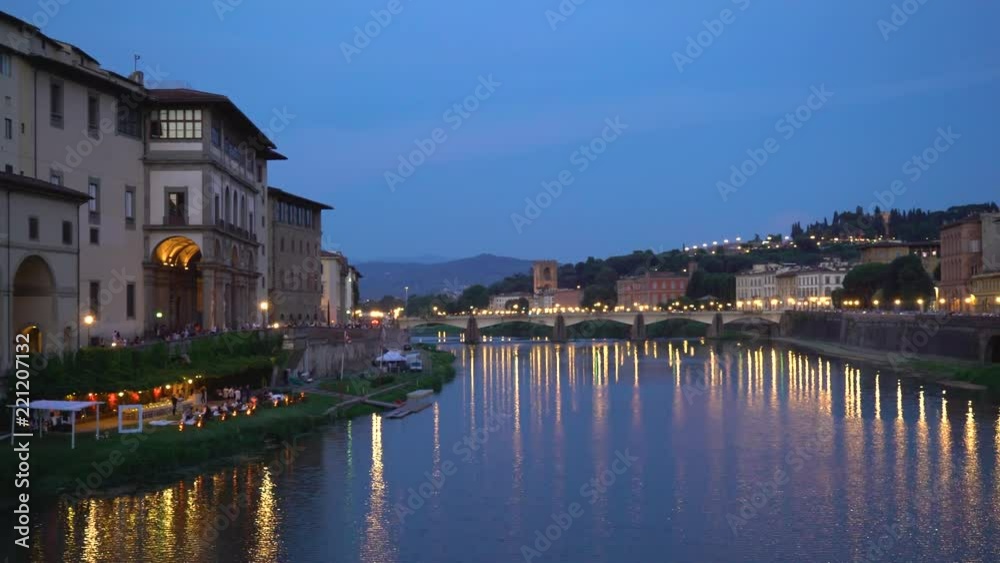 Florence, Tuscany, Italy — 21 June 2018. Night view of the Arno river and Ponte alle Grazie bridge Florence, Tuscany, Italy — 21 June 2018. Night view of the Arno river and Ponte alle Grazie bridge
