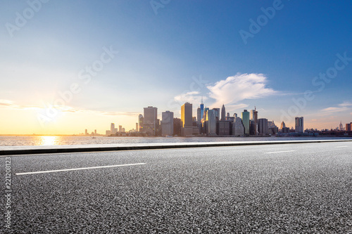 empty asphalt road through modern city