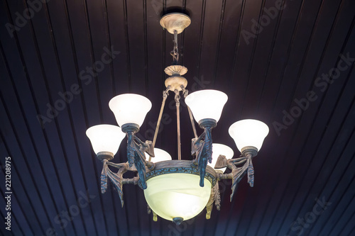 Ceiling lamp. Interior Lighting. symmetry. A group of hanging lights with shallow depth of field. Beautiful chandelier isolated