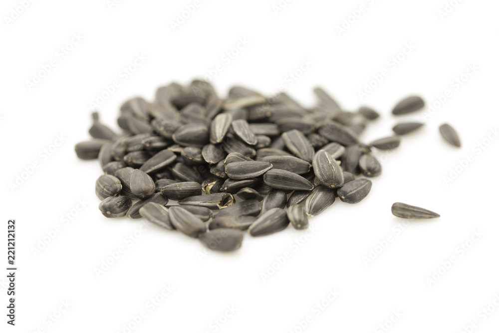 fried sunflower seeds on white background fried sunflower seeds on white background