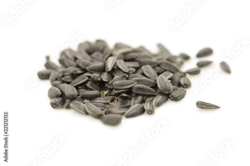 fried sunflower seeds on white background