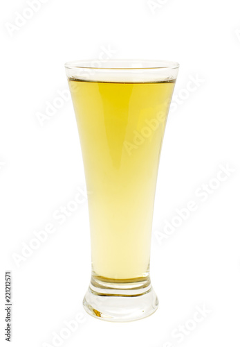 a glass of yellow drink isolated on a white background