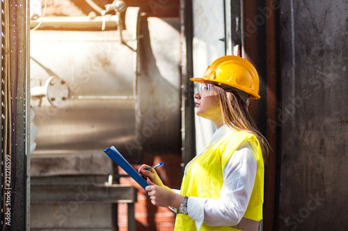 Obraz na plátně Portrait of female quality inspector