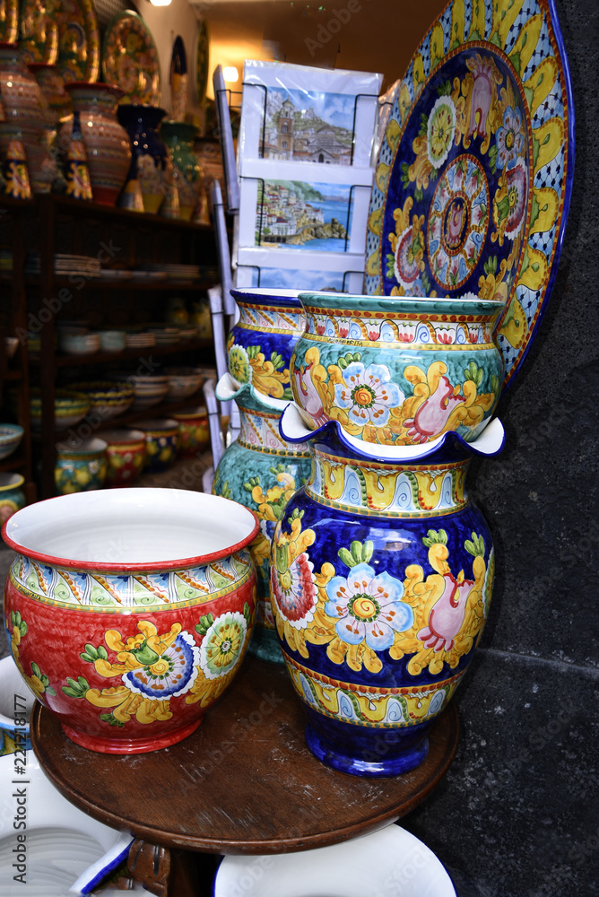 Colourful and stunning ceramic items in the narrow streets of Amalfi in Southern Italy