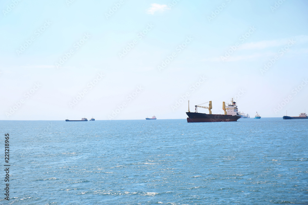 Beautiful view of ships in sea on sunny day