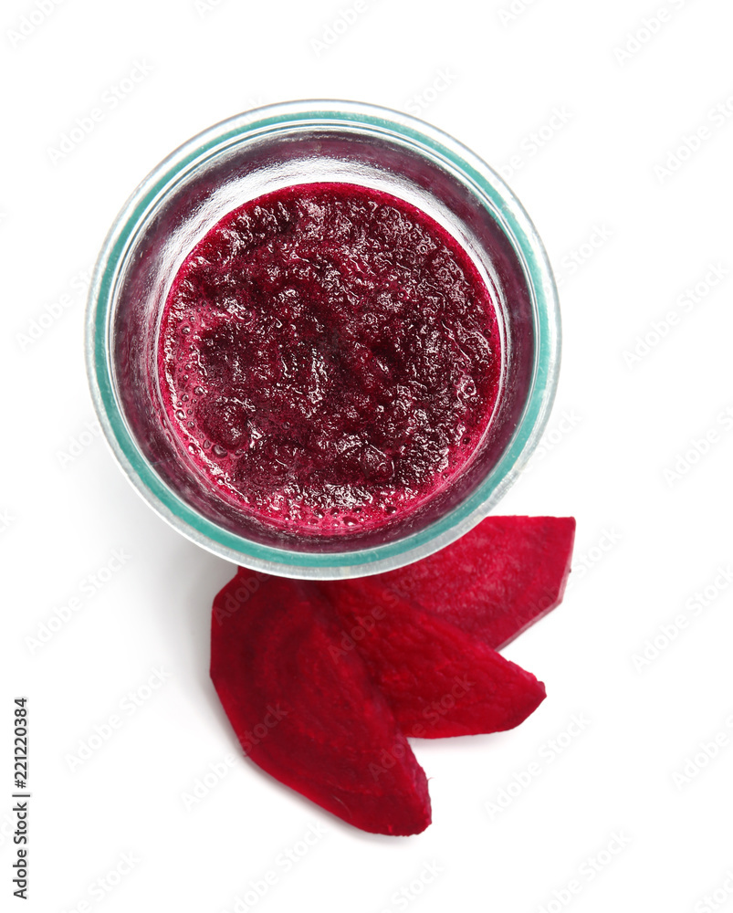 Glass of beet smoothie on white background, top view Glass of beet smoothie on white background, top view