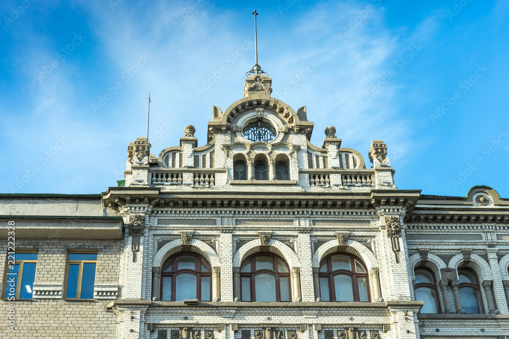 The upper part of a beautiful old building in Vladivostok.