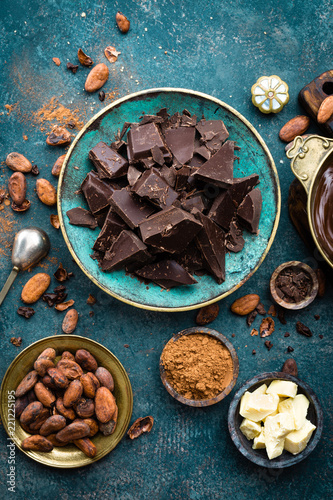 Chocolate. Dark bitter chocolate chunks, cacao butter, cocoa powder and cocoa beans. Chocolate background