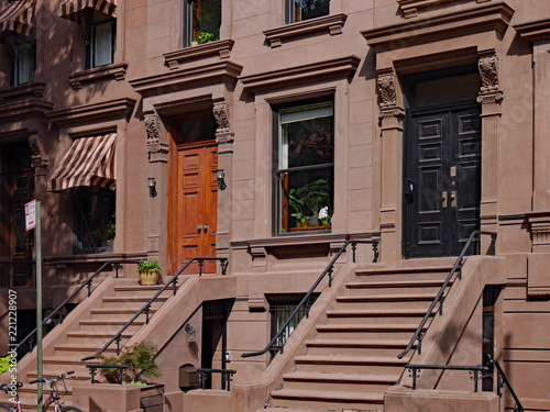 front steps of New York brownstone apartment buildings