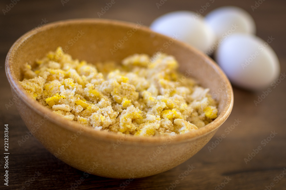 Farofa de ovos - scrambled eggs with flour - typical food of Brazil Farofa de ovos - scrambled eggs with flour - typical food of Brazil