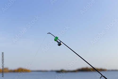 fishing rod on the river background