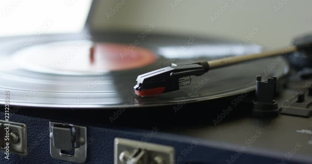 Record player playing vinyl very quickly - close up Record player playing vinyl very quickly - close up
