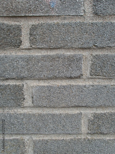 detail of an old concrete brick wall