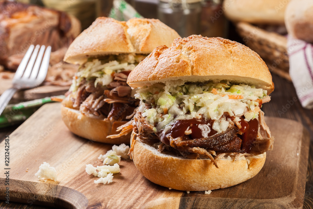Homemade pulled pork burger with coleslaw salad Homemade pulled pork burger with coleslaw salad