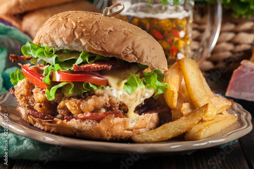 Chickenburger with bacon  tomato  cheese and lettuce