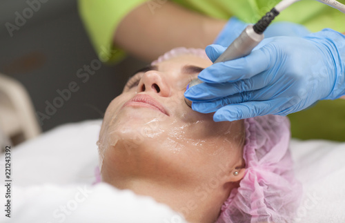 Portrait of woman getting rf-lifting. Rf lifting procedure in a beauty parlour