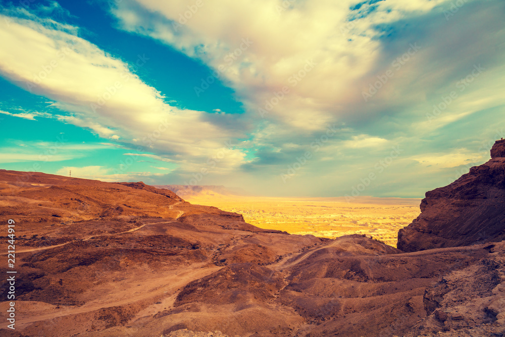 View from Masada at the valley in Judaean Desert in the early morning. Israel