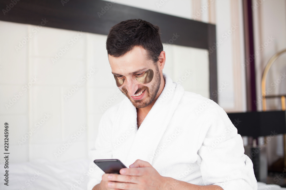 Man making some important calls after waking up Man making some important calls after waking up