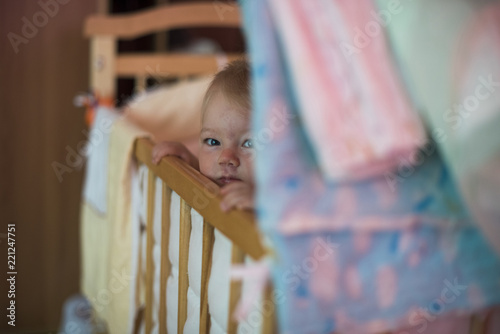 child in a cot