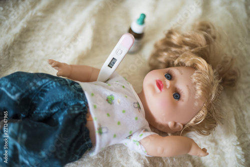 Treating a doll