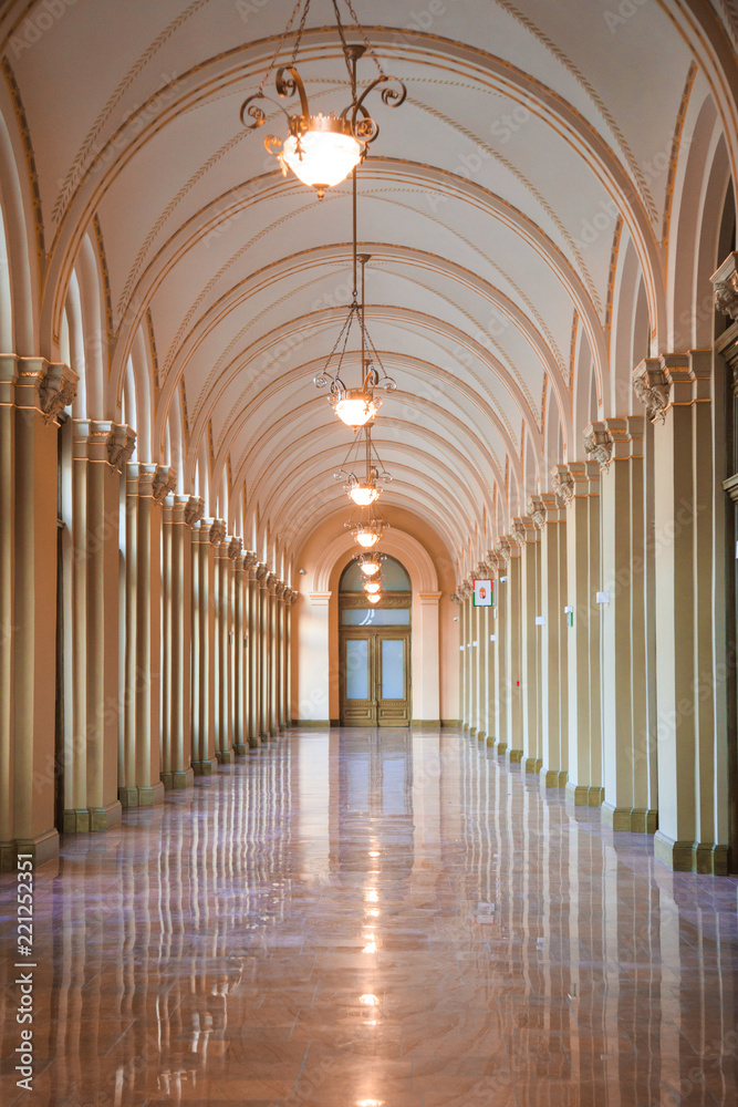 ancient white corridor with arch in budapest