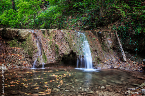 Kaverzinsky small waterfall in the Caucasus mountains. Russia, Krasnodar region