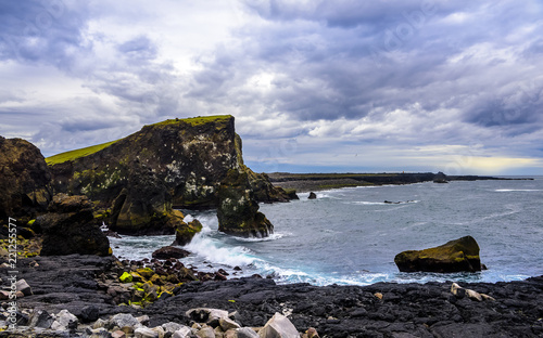 Rugged Icelandic Atlantic Ocean coastline and stormy seas photo