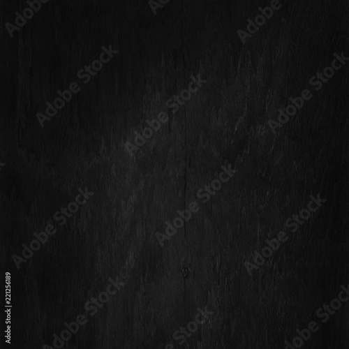 Black wooden wall background, texture of dark bark wood with old natural pattern for design art work, top view of grain timber.