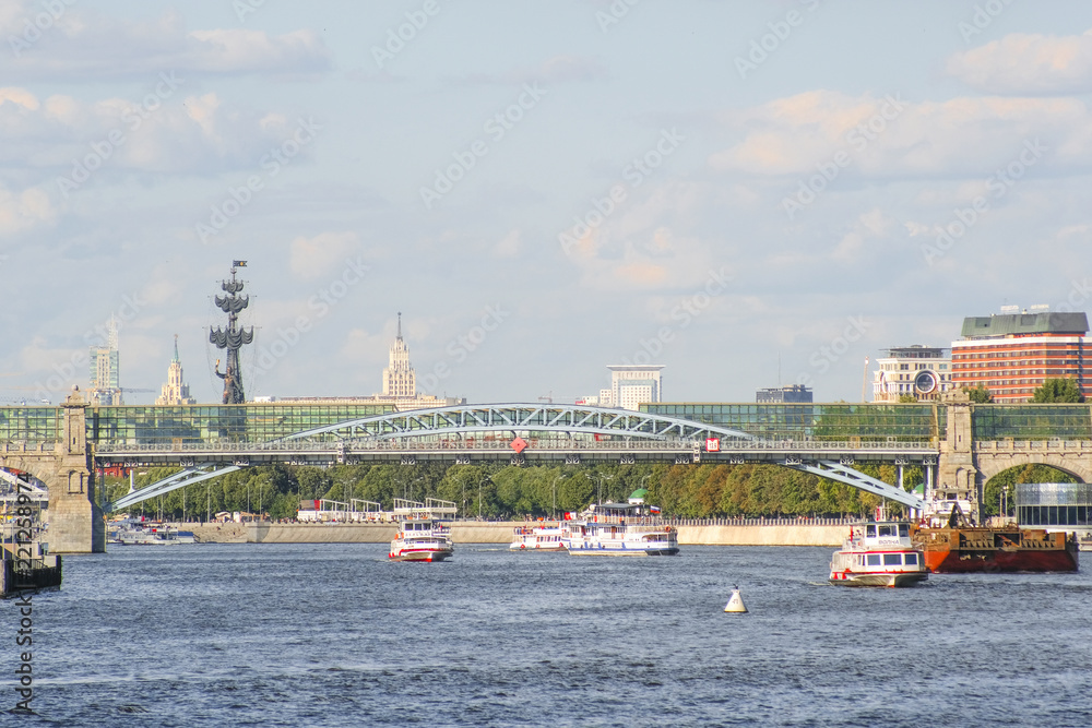 Moscow, Russia - August, 15, 2018: Boats on Moscow river in a center of Moscow, Russia Moscow, Russia - August, 15, 2018: Boats on Moscow river in a center of Moscow, Russia