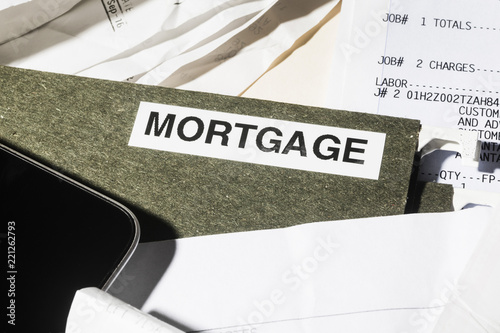 Close up mortgage file and finance paperwork