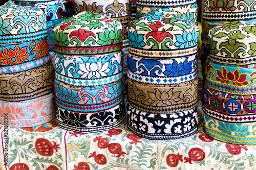 The traditional Uzbek cap named tubeteika, decorated with multi colored embroidery. Bukhara, Uzbekistan, Central Asia