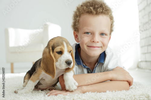 Child with a dog  © nuzza11