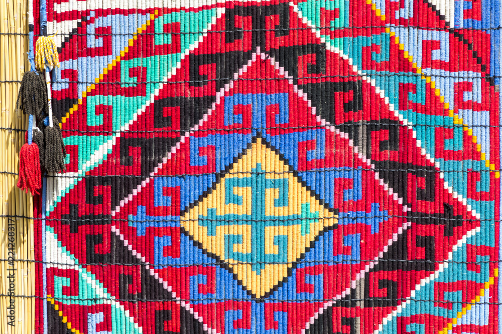 Market stalls with decorative tribal textile with colourful pattern made in Central Asia, Uzbekistan. Market stalls with decorative tribal textile with colourful pattern made in Central Asia, Uzbekistan.