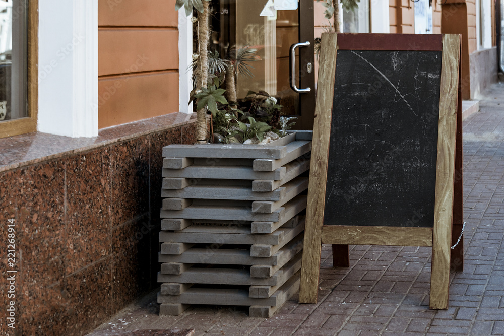 Street chalk board, outdoor stand, summer day Street chalk board, outdoor stand, summer day