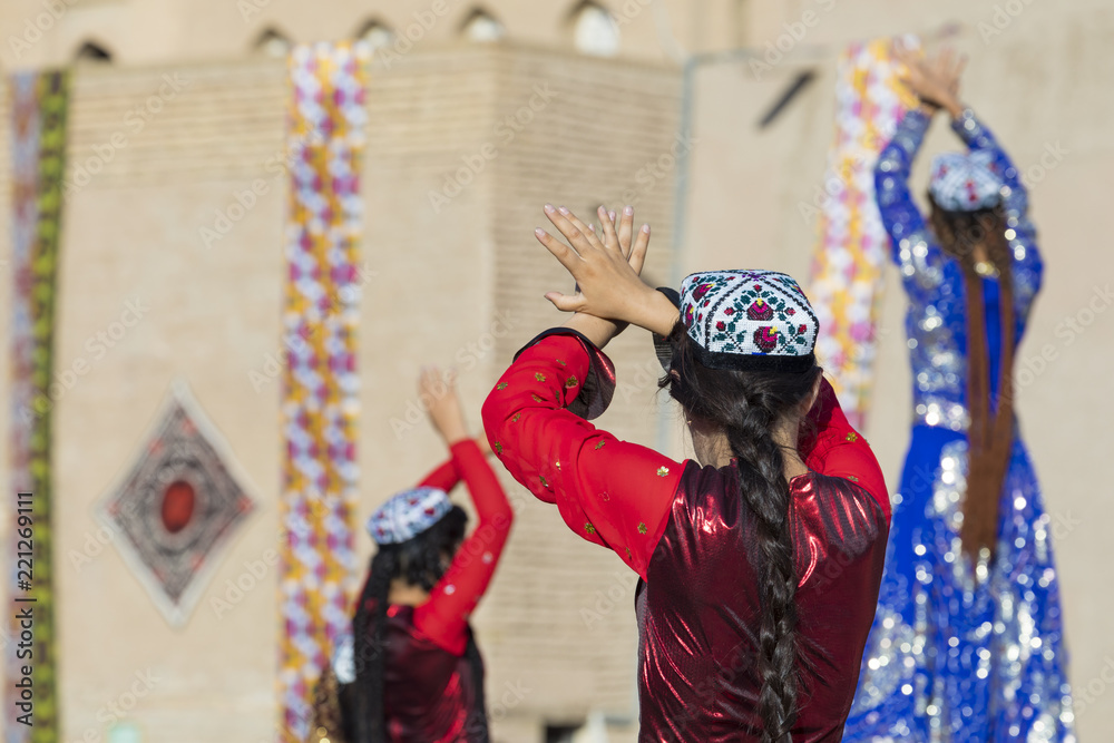 Folk dancers performs traditional dance at local festivals in Khiva, Uzbeksitan.