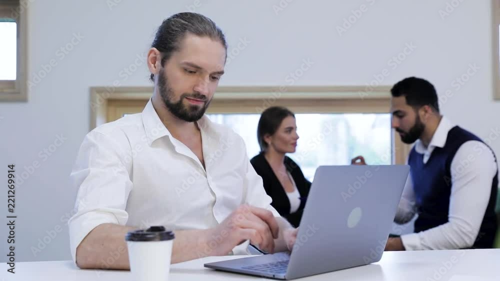 Business Man Working On Computer In Office. Business People Business Man Working On Computer In Office. Business People