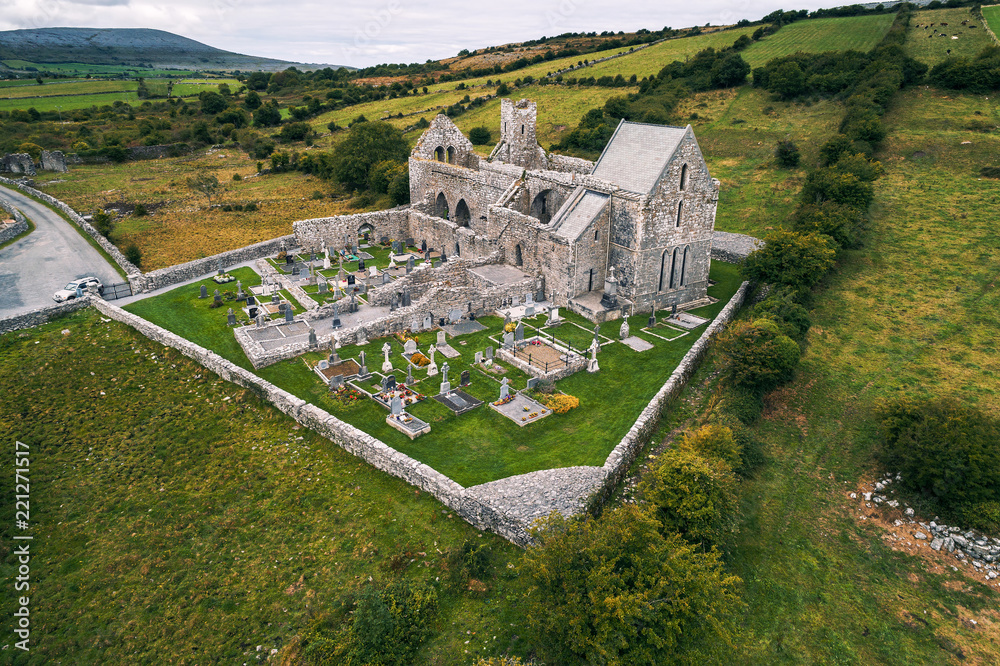 Aerial view of Corcomroe Abbey ruins and its cemetery
