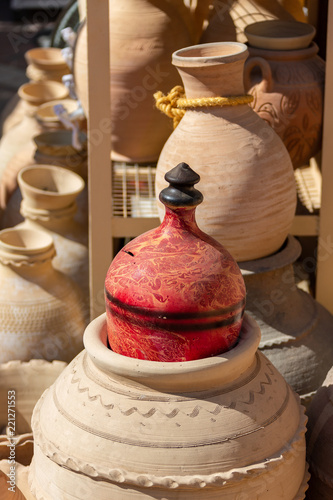 Pots in Nizwa fort, Oman, Sultanate of Oman. . photo