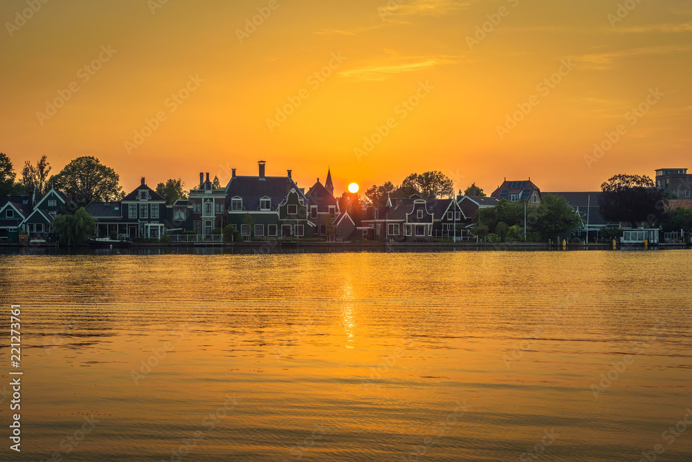 Sunset above the beautiful village of Zaanse Schans in Holland