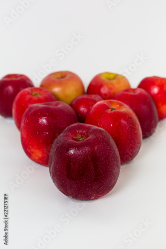 Red apples on the white background 