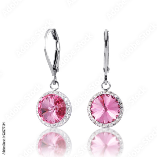 beautiful pink diamon earrings with reflection on white background