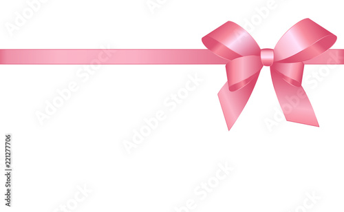 Decorative pink bow with horizontal pink ribbons isolated on white. 