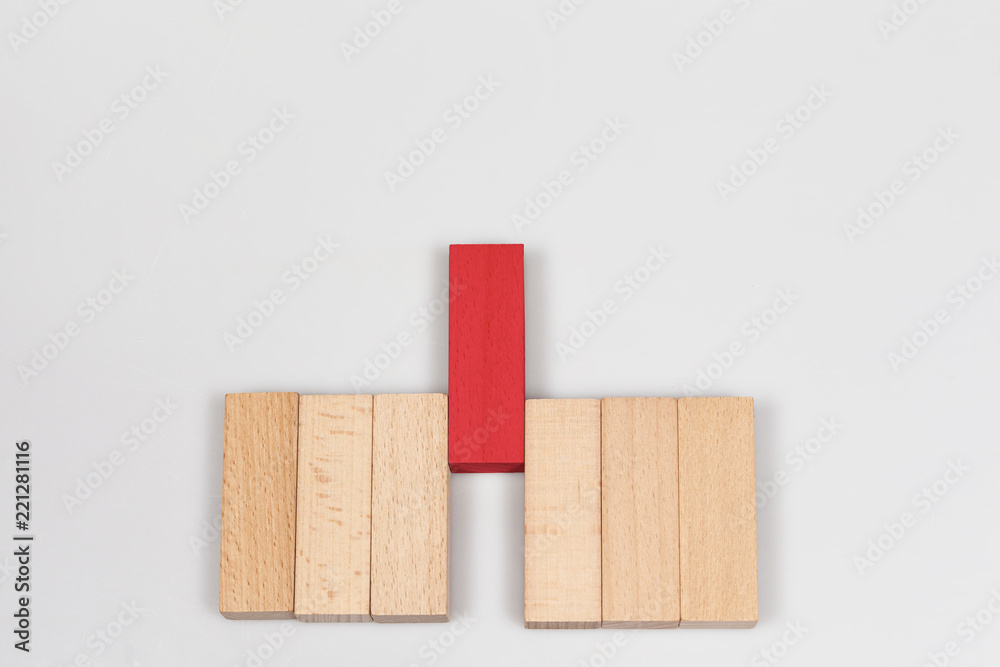 Arranging wood block stacking red block in the middle. Ladder career path. Arranging wood block stacking red block in the middle. Ladder career path.