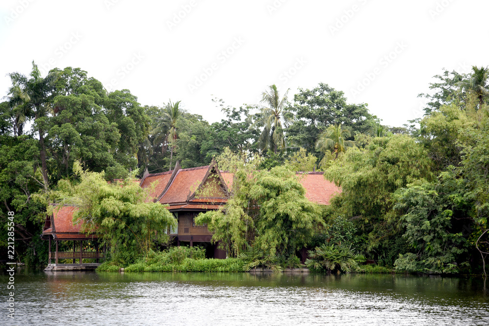 Thai House in garden on riverside in Thailand. Thai style house.