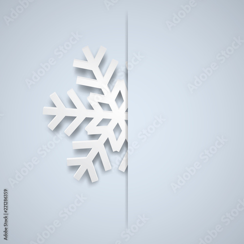 Christmas illustration with one white big snowflake which protrudes from the cut on a light blue background