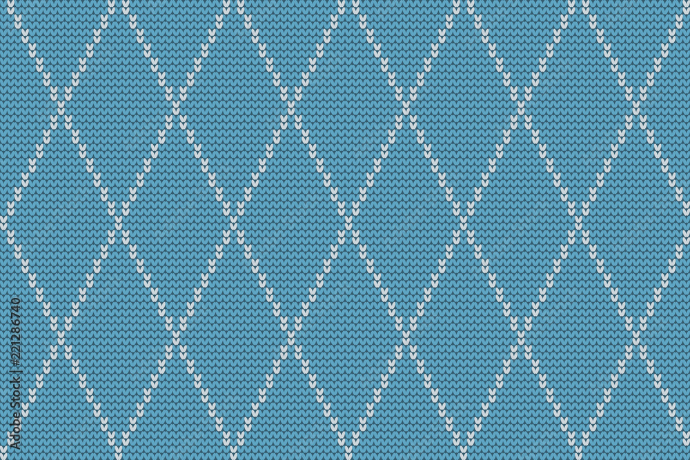 Seamless knitted pattern with white rhombuses on a blue background. Checkered winter background. Vector illustration Seamless knitted pattern with white rhombuses on a blue background. Checkered winter background. Vector illustration