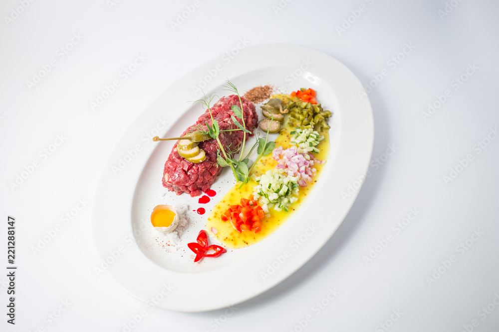 Tartarus from young calf with capers, gherkins, onion and quail eggs