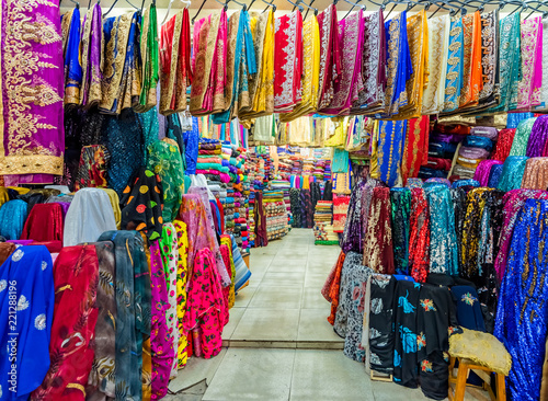 ifferent traditional local clothes are for sale © epic_images