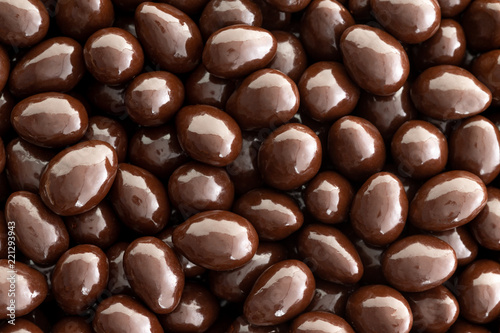Macro background texture of chocolate almonds